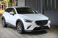 特別仕様車「エクスクルーシブ モッズ」のエクステリア。カタログモデルとは異なる、高輝度ダーク塗装のアルミホイールが目を引く。