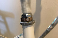 Mt富士ヒルクライムレースで90分を切るともらえる「“ブロンズ”フィニッシャーリング」。娘がレースに出場したのを記念して、ハンドルコラムに取り付けてあげた。