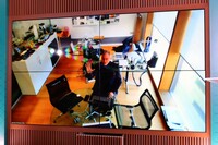 当日は、アストンマーティン・チーフ・クリエイティブ・オフィサーのマレック・ライヒマン氏(写真中央)もオンラインで出席。2023年の事業計画に触れたほか、アストンマーティンの歴史的モデルが持つ魅力について熱く語った。