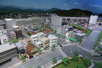 目玉のひとつである、87分の1(HOスケール)で再現されたジオラマの一部。これは静止状態だが、“ショータイム”になると明け方から深夜までの1日の動きを15分で再現、さまざまな車両が街を走り回る。