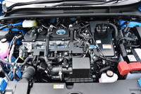 ハイブリッド車のパワーユニット。1.8リッター直4エンジンにモーターが組み合わされる。