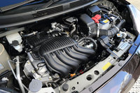 いたるところにモータースポーツで培った技術が取り入れられた1.6リッター直4エンジン。加工や組み立てに関しても、レース用エンジンの製作を手がけてきた職人が担当している。