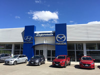 同じ店を2016年に撮影したもの。併売しているマツダのカラーも当時はブルーであった。