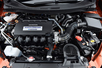 1.5リッター直4エンジンをベースとするハイブリッドユニット。JC08モードの燃費値は24.2km/リッター。