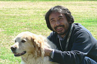 「エアラインに強いカメラマン」小林稔さん(右)。