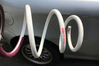 以前に乗っていた「147」でタイヤハウスの隙間がずっと気になっていたことから、車高はショートスプリングで2cm下げている。