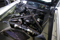 ミドに搭載される6.5リッターV12エンジン。700ps/8250rpmと70.4kgm/5500rpmを発生する。