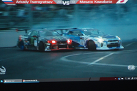 
	発表会で放映された、2017年大会のワンシーン。これはTSUISO（追走）と呼ばれる決勝トーナメントにあたるプログラムで、2台の対戦車両が同じコース内を同時に走り、技を競う。
	