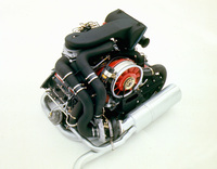 テールエンドの左下側にターボチャージャーを備える。ターボ化によってエンジンの発生する熱量はポルシェの生産車中最大となり、冷却ファンの回転の速さを、11枚ブレードのままでクランクシャフトの1.3倍から1.67倍に引き上げている。