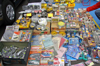 パーツ、ミニカー、雑誌、新型車解説書……取り扱い商品の幅が広いブース。