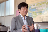 プロダクトエグゼクティブの岡本金典さん。
