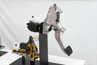 「電動サーボブレーキシステム」の模型。減速、制動時により広い範囲でエネルギーを回収しつつ、自然な操作感を実現するためにブレーキの作動を電動化したものだ。