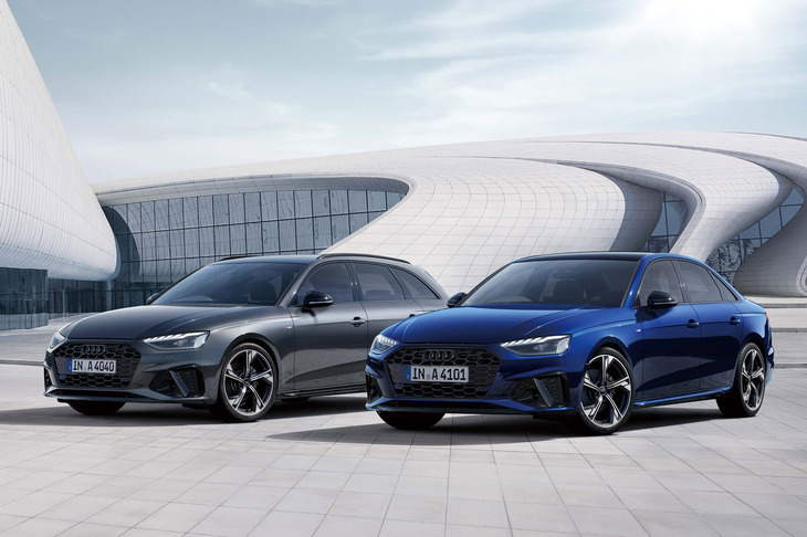 「アウディA4ブラックスタイルプラス」（写真向かって右）と「A4アバント ブラックスタイルプラス」（同左）。