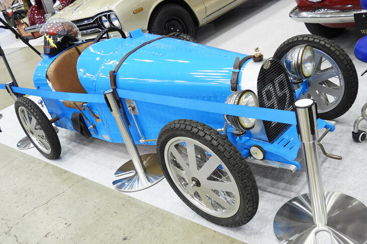 「オートモビル カウンシル2024」の会場より、Wolf Racingの出展ブースの様子。