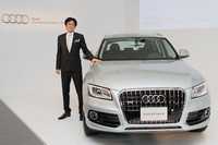 「アウディQ5ハイブリッド」とアウディ ジャパンの大喜多寛社長。