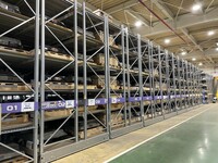 フォーアールエナジーの浪江事業所には、国内外の日産販売網から使用済みのリチウムイオンバッテリーが集まってくる。その保管スペースには、バッテリーユニットが写真のようにうずたかく積み上げられている。