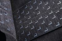 当時エルメネジルド・ゼニアが参画したベロア生地には、ランチアの頭文字である「L」が織り込まれている。