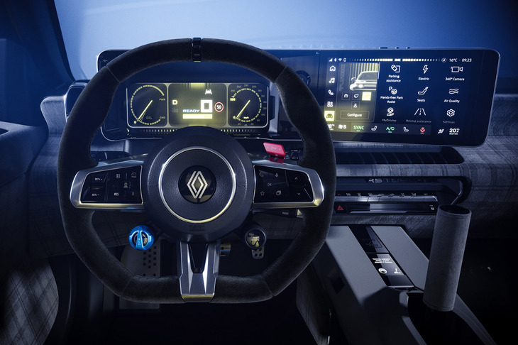 「5ターボ3E」のコックピット。アルピーヌブランド初のBEV「アルピーヌA290」譲りとなるDシェイプのステアリングホイールと、ラリーカーのようにそそり立つ電子制御サイドブレーキレバーがスパルタンな雰囲気を演出している。