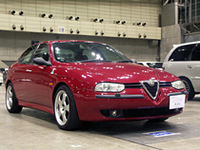 写真F：老舗ショップ、コルトレーンはアルファ156にイタリア製のスピーカーを付けてコンテスト参加。他メーカーの製品の参加を認め、いい音ならきちんと評価する度量の広さもパイオニアならでは。