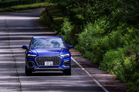 山岳路を行く「Q5スポーツバック ファーストエディション」。コイルスプリングに電子制御の連続可変ダンパーを組み合わせた「ダンピングコントロール付きサスペンション」が装備されるのは、現時点ではファーストエディションだけだ。