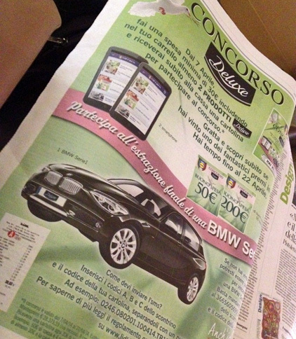 ドイツ系ディスカウントスーパー「リデル」の新聞告知。賞品は「BMW 1シリーズ」である。