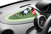 「ルノー・トゥインゴ」のカタログ写真。“剣山”トレイには「iPod nano」が。