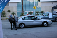 オートショーの関連イベント「オートモビリティーLA」で演奏していたバンドマン。トランクスルー機能を使い、商売道具のキーボードを見事「フォード・トーラス」に飲み込ませてしまった。