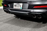 
	4本出しのテールパイプもブラックのカラーリングで統一されている。写真は「X4 Mコンペティション」のもの。
	