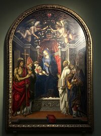 フィリッピーノ・リッピ《王座の聖母子と聖人たち》　1485-1486年。フィレンツェ・ウフィッツィ美術館蔵。作者は“豪華王”ロレンツォ・ディ・メディチから1200リラという高額な報酬を手にした。筆者撮影。