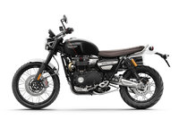 
	「スクランブラー1200 XC」のサイドビュー。エキゾーストパイプとマフラーは車体右側にレイアウトされている。
	