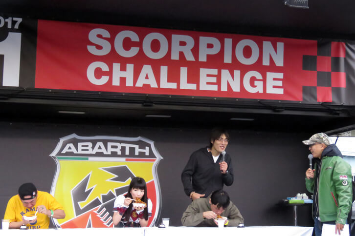 自動車関連の企画に加え、イベントステージでは激辛パスタ チャレンジ選手権も開催。結果は、“プロ”の大食い選手であるジャイアント白田氏と、もえのあずき氏を押しのけて一般参加者が優勝！ 波乱の幕切れに、イベントステージは大いに盛り上がった。