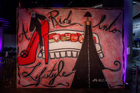 エントランスを飾るレベッカ・モーゼス氏のアート。イベント名の「RIDE INTO LIFESTYLE」に加え、右下には「ALCANTARA」の文字が。