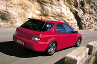 
	写真上：「インプレッサ WRX STi」
	写真下：「インプレッサ ワゴン」のリアビュー
	 