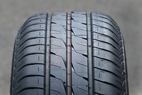 写真はセダン・クーペ専用の「エコピアEX20」。ラベリング制度におけるウエットグリップ性能の最高グレード「a」を19サイズ中18サイズで達成している。
    