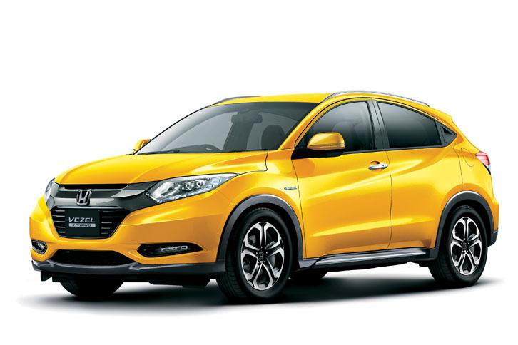 「ホンダ・ヴェゼル ハイブリッドX Honda SENSINGブリリアントスタイルエディション」。ボディーカラーは専用色の「プレミアムイエローパールII」。