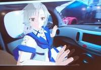 「助手席にバーチャルな彼女を乗せてドライブ」の図。「I2V」のテクノロジーが完成すると、このような体験が現実のものとなる。