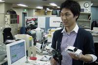 写真がボクです。そして左手に持っているのが、勢いで買ってしまった「ランチアデルタ HF インテグラーレ6」。限定品です。