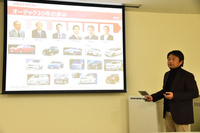 オーテックジャパンの歴史について紹介する、同社商品戦略部 部長の永澤清和氏。