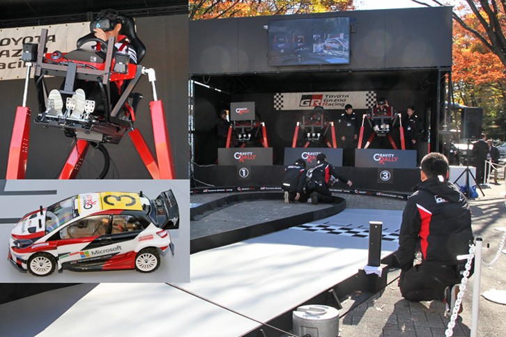 TGRとタミヤのコラボによる「グラビティ・ラリー」。シミュレーターに乗り、ヘッドマウントディスプレイを装着した参加者が、カメラ付きの10分の1のRCカーを、ジャンプ台もあるコースで走らせる。