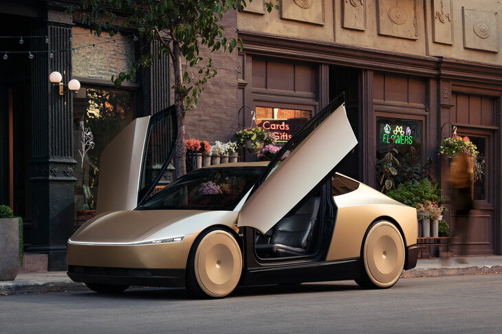 写真のとおり、「ロボタクシー」のドアはスーパーカーよろしく斜め上に開く。