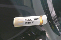 小さな会場で提示された明日へのメッセージの画像