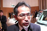 
	タント開発責任者の薗田孝主査
	 