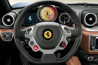 ウィンカーレバーなどステアリングコラムから伸びるアーム類が廃され、さまざまな制御系がステアリング上に集められた。写真では確認しづらいが、シフトパドルの形状も変更を受け、上下に長くなっている。