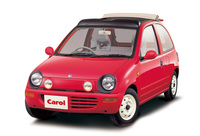 1989年に登場（復活）した「オートザム・キャロル」。丸っこいスタイルのボディーには写真のキャンバストップ仕様なども用意され、日産のパイクカーのようなファンカー的な雰囲気も備えていた。