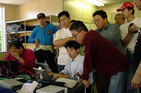 このプロジェクトには、通信関連の企業、大学、団体が参画。ルート（株）、東京工業大学、（財）九州システム情報技術研究所、（財）京都高度技術研究所、独立行政法人通信総合研究所（株）スプライト（有）リンクスから、スペシャリストが集まった