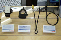 会場には、ESCの構成部品も並べられた。システムは年々小型化。2009年にデビューする「ESP Gen 9」は、現行型より25％軽量化されるという。