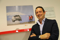 ユーロモーターの営業担当ロベルト・カッペッリ氏。自分の商談スペースには、座右の銘「改善」が掲げられている。