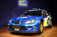 写真は、会場に置かれた2006年モデルのアトキンソン車。こころなしかマシンも「名誉挽回に燃える表情」に見える（？）