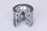 新形状の燃焼室と、シリカ強化多孔質陽極酸化膜のコーティングが採用されたピストン。
    