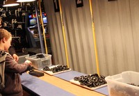 「T型」のスケールモデルを通じて、作業の分業化を学べる一角。